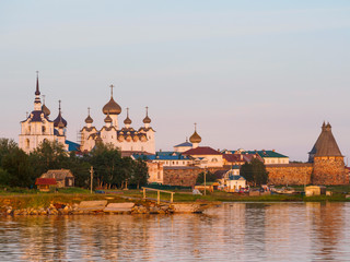 Fototapeta na wymiar View On Solovetsky Monastery Walls, Towers And Churches On Summer Evening