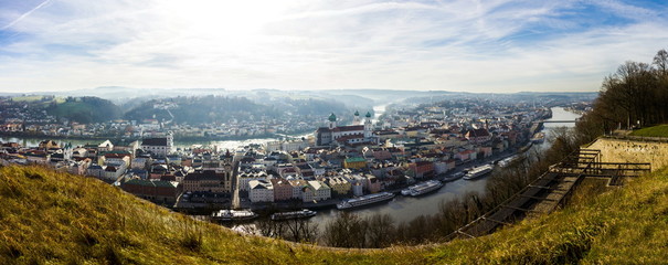 Fototapeta premium View of Passau with Danube river, embankment and cathedral, Bavaria, Germany