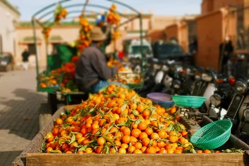 Keuken spatwand met foto traditional morocco fruits oranges in street shop souk © Elena Moiseeva