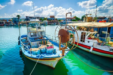 Wandcirkels tuinposter Fishing boat in harbor, Cyprus, Paphos district © romanevgenev