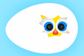 Curious eyes of a little bird look through cracked egg