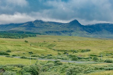 lands between sky and ocean panorama of Scotland in England in summer