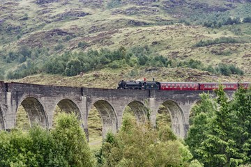 Fototapeta na wymiar Glenfinnan In Scotland England famous for its steam train aqueduct that inspired the Harry Potter film
