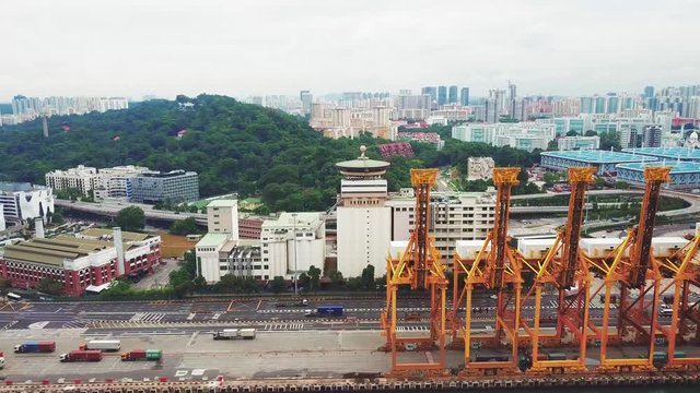 Singapore. November 21, 2017: Aerial footage of row of crane in Singapore container port. Shot in 4k resolution