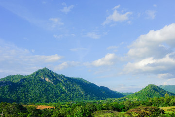 mountains green grass and blue sky landscape in Thailand.- (Selective focus)