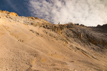 Hiking on debris in mountains