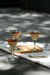 Close up Panna Cotta with Coffee Syrup. (selective focus)