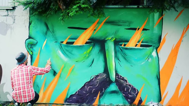 Graffiti on a fence.