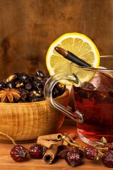 Hot rosehip tea against influenza. Home cold treatment. Dried vitamins. Traditional folk medicine.