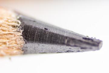 Pencil point close-up on white background