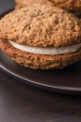 Close up Homemade Malt and Oat Cookie Sandwiches . (selective Focus)