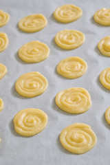 Close up Homemade White Chocolate Cat’s Tongue Cookies . (selective Focus)