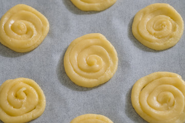 Close up Homemade White Chocolate Cat’s Tongue Cookies . (selective Focus)