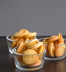 Close up Homemade White Chocolate Cat’s Tongue Cookies . (selective Focus)