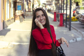 Fototapeta premium Girl talking on the phone