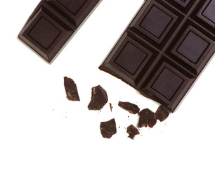 Broken chocolate bar isolated on white