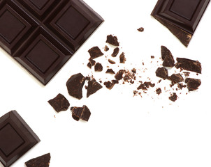 Broken chocolate bar isolated on white