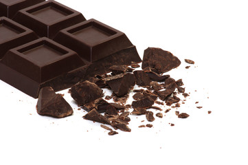 Broken chocolate bar isolated on white