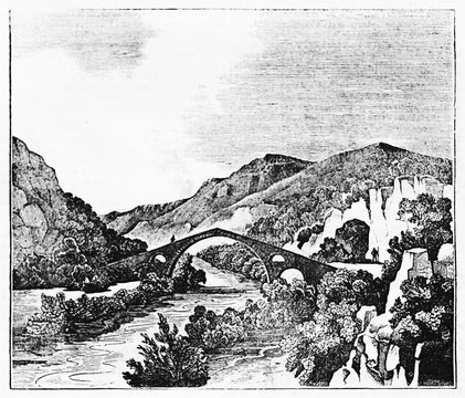 Ancient medieval gothic bridge crossing a river surrounded by vegetation, Eurotas river in Laconia Greece. Old Illustration by unidentified author published on Magasin Pittoresque Paris 1834.
