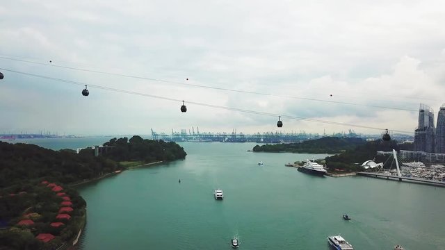 Singapore. November 21, 2017: Aerial shot of cable cars transportation to sentosa island in Singapore. Shot in 4k resolution