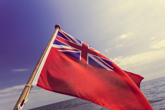 Fototapeta uk red ensign the british maritime flag flown from yacht
