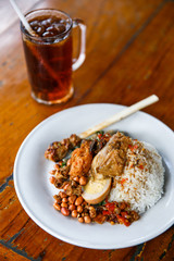 spicy balinese nasi campur with ice tea