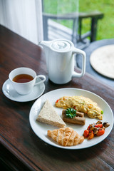 english breakfast with a cup of a tea