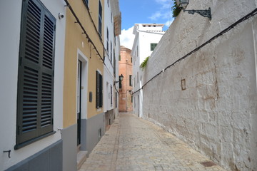 Narrow street in Ciutadella de Menorca, Spain