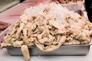 Gut of pork in the tray at market