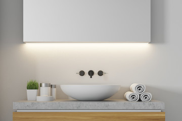 Naklejka na ściany i meble White bathroom with a sink close up