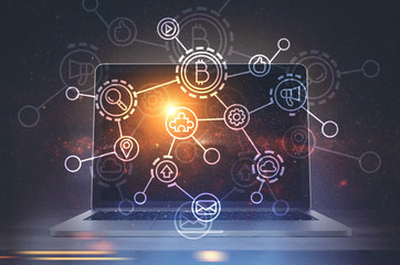 Bitcoin hologram and a laptop