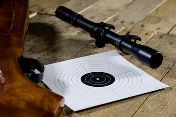 shooting, pneumatic and firearms on a wooden table. Table on the shooting range, weapons and shooting accessories.