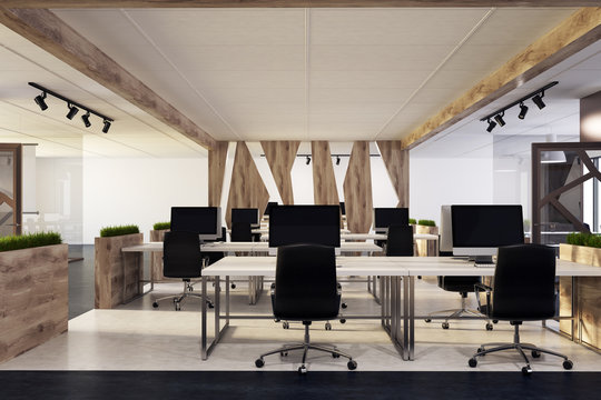 White office, wooden desks, black chairs