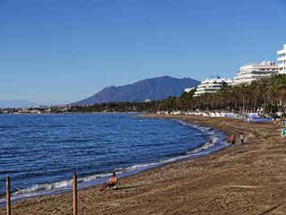 Fototapeta na wymiar Quiet Beach in November in Marbella Andalucia Southern Spain 