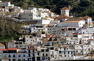 spanish village with white houses on the mountain