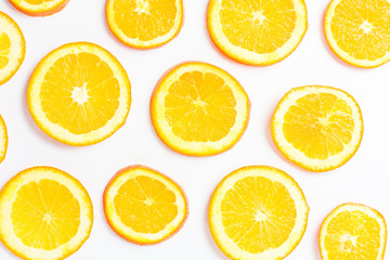 Obraz premium Bunch of orange fruit slices pile