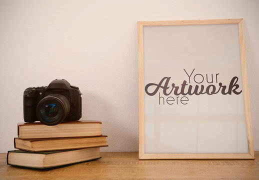 Picture Frame Mockup with Camera and Books
