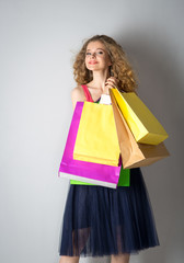 Young woman with shopping bags.