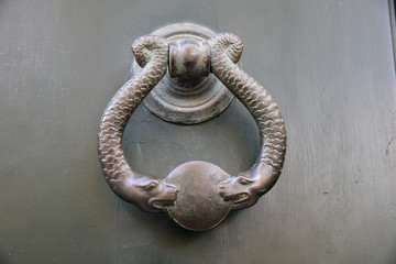 Poignée de porte ne fer forgé à double tête