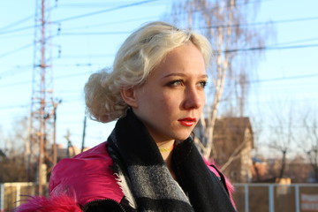Fototapeta na wymiar Portrait of a girl, actress on the street.