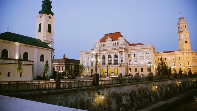 View of Oradea City Hall and river Crisul Repede in night, Romania
