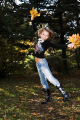 funny  girl jumping outdoors