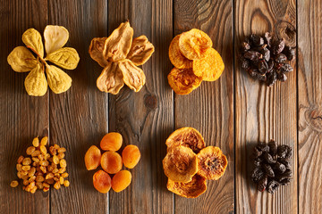 Dried fruits on wooden background