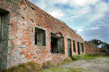Fototapeta na wymiar Remainders of an old German bunker, part of the Atlantikwall, in the dunes of the dutch island Terschelling