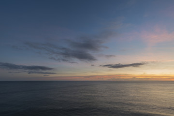 Fototapeta na wymiar Stunning landscape image of calm sea at St Govan's Head on Pembrokeshire Coast in Wales