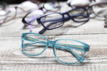 Glasses on bright wooden background