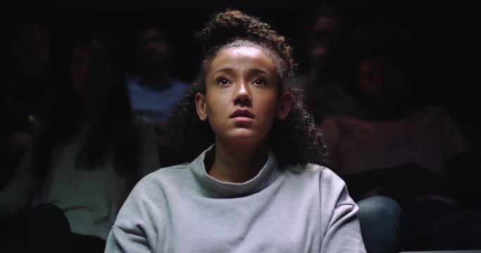 A mesmerising movie captivates a young woman at the movie theatre