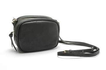 Naklejka premium small black handbag with zipper isolated on white