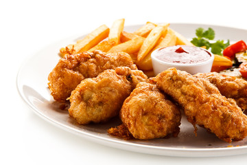 Fried chicken nuggets and vegetables 
