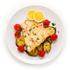 Fish dish - roast cod fillet and vegetables 